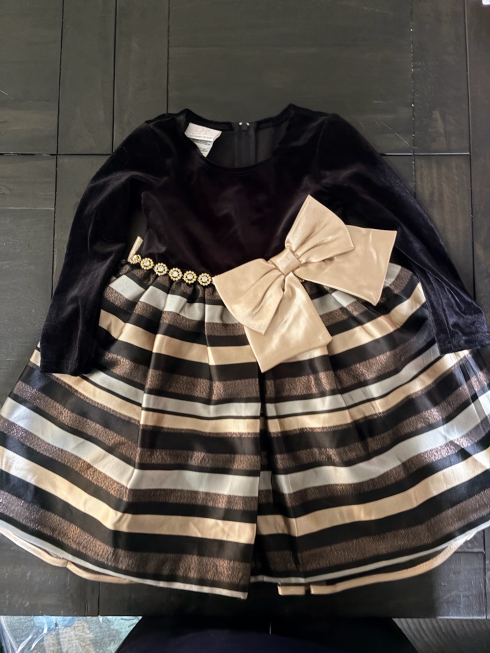 Black and Gold Striped Dress with Bow Accent